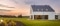 Das Bild zeigt ein Bild von einem Haus mit Garten und Sonnenuntergang im Hintergrund.
